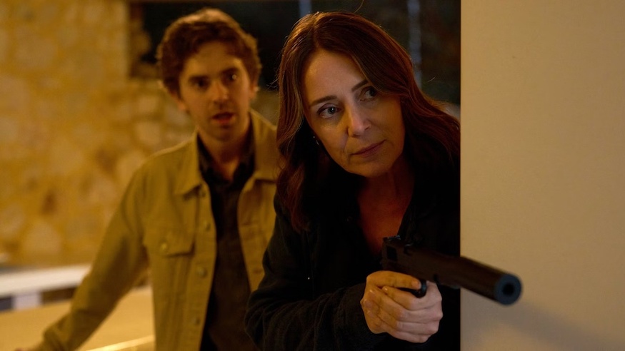 The Assassin with Keeley Hawes holding a gun